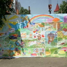 В Житомире дети в свой праздник преобразили «зеленый забор» на Михайловской. ФОТО