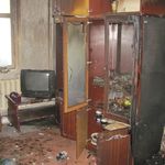 В Житомире грабители сожгли квартиру и убили самогонщицу. ФОТО