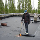 Город: Власти Житомира предлагают ремонтировать крыши многоэтажек за счет самих жителей