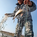 Браконьеры на севере Житомирской области ловили рыбу 80-метровой сетью