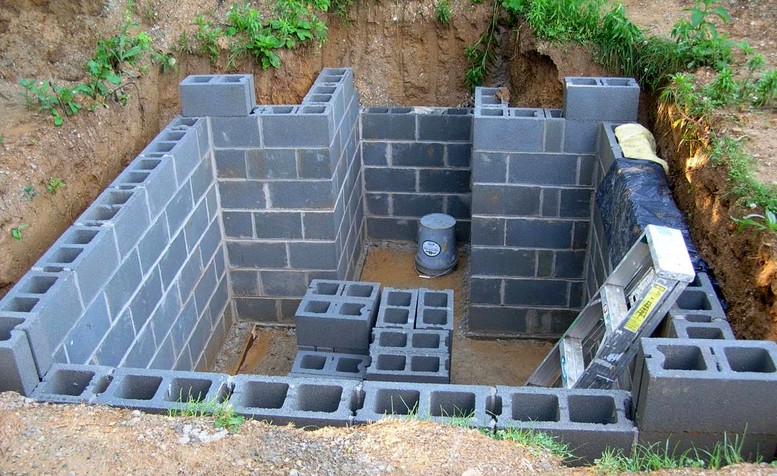 Строим двухъярусный подземный погреб: особенности гидроизоляции