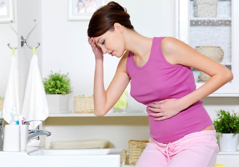 Почему происходит тошнота в период беременности?